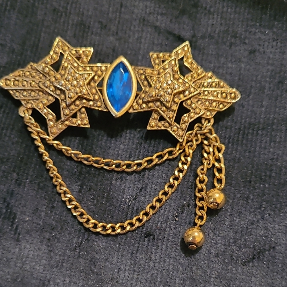 Vintage 1980's A.J.C.  Goldtone Textured Star And Blue Detail Brooch With Chains
